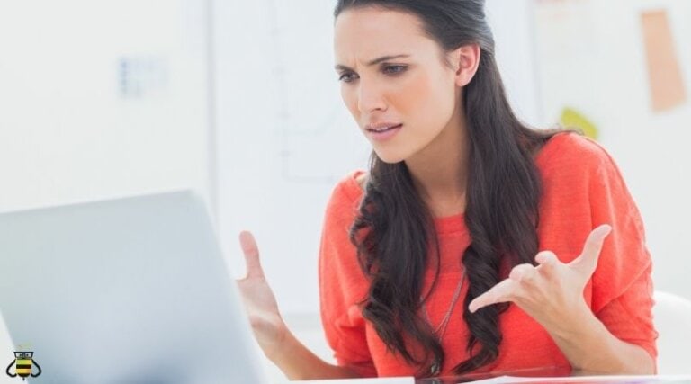 woman frustrated at laptop