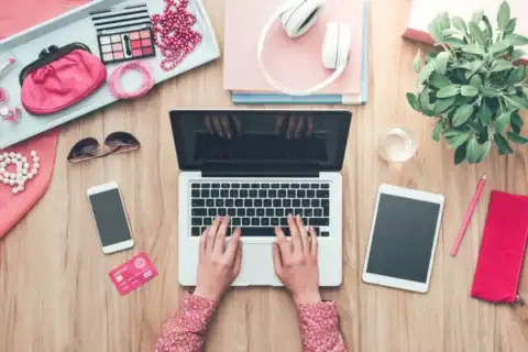 Planning viral blog content ideas with notebook and laptop