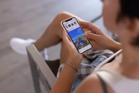 User scrolling Instagram feed on mobile device