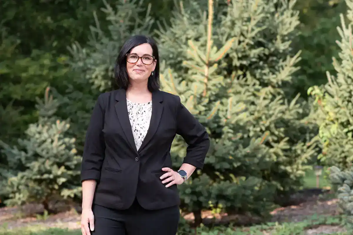 Confident business owner reviewing 2026 marketing budget and performance reports for 2026 planning