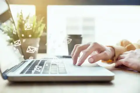 User clicking unsubscribe link in small business email newsletter