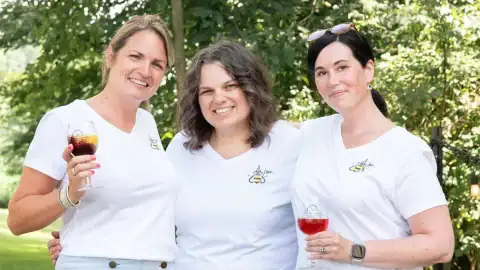 Free Digital Marketing Tactics blog image of 3 girls standing together smiling for the camera
