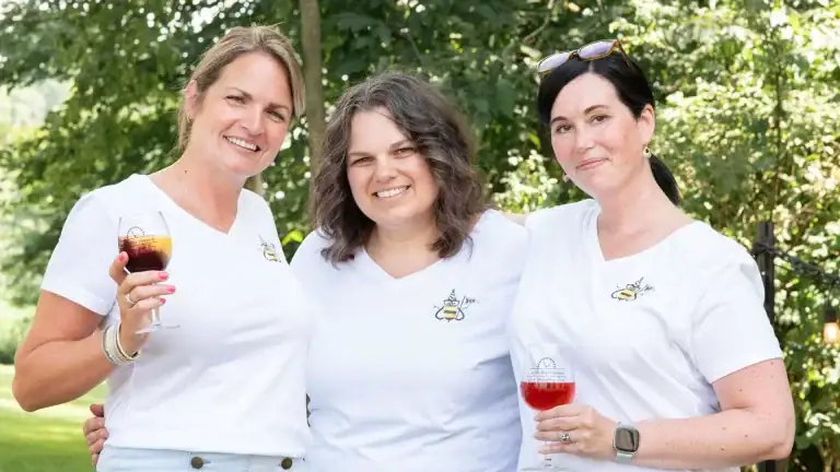 Free Digital Marketing Tactics blog image of 3 girls standing together smiling for the camera